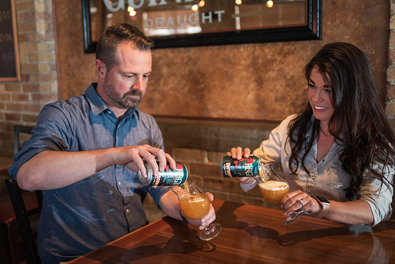 SLUG beer experts Chris and Sylvia Hollands testing the Batsquatch pour.