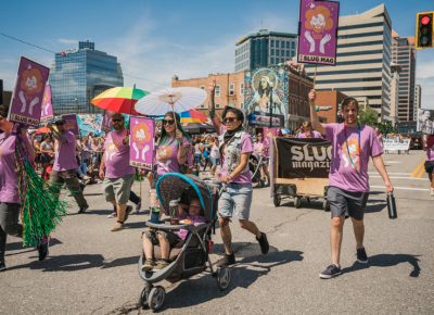 Framed in the brightly lit downtown SLC, the SLUG crew represented the magazine with smiles from ear to ear.