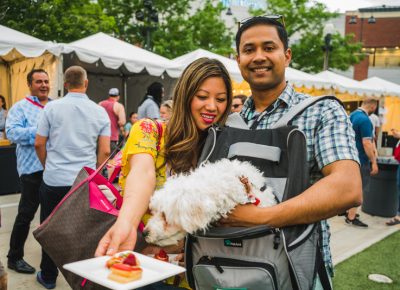 (L–R) Annie, Jackson and Dean Kazi make their way through the maze of food to find their favorite plate of the night.