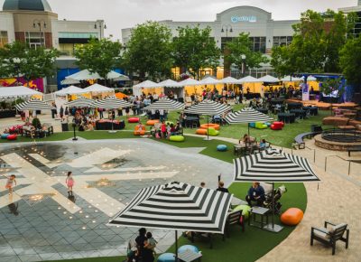 Overlooking the festival grounds, we can see the crowds as they make their way out to the shuttle for the stops around town.