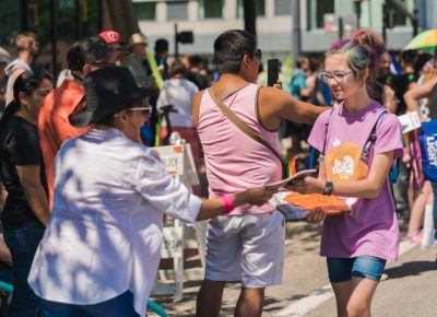 Parade patrons were excited to get their hands on one of our print magazines as we passed them out throughout the parade.