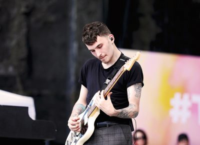 Alex Babinski, playing guitar for PVRIS at Loveloud.