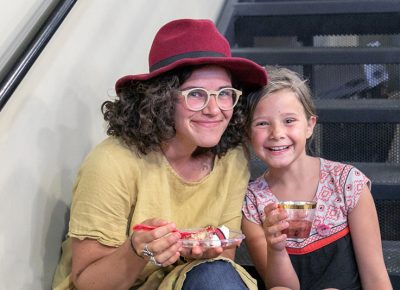 (L–R) Jessie and Scout Huish live just around the corner and walk to Weller Book Works all the time. As a young girl, Jessie used to by a new journal every six months from Sam Weller’s Books.