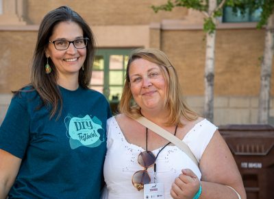 (L-R) Mindy Loki and Brandy Oliver volunteered at the DIY Festival. Loki demonstrated Ozobot robots in the STEM building and Oliver, a Craft Lake City executive board member, worked in the sustainers tent, where she described how monthly donations at craftlakecity.com/donate help fund crafty education and programming throughout the year.