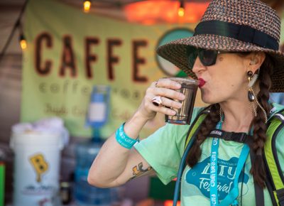 Craft Lake City Executive President Angela Brown sips Caffe Ibis’s iced coffee as the 2019 DIY Festival winds down Sunday, August 11. This 11th annual event marked its second decade with a new home at the State Fairpark, and Brown couldn’t be happier.