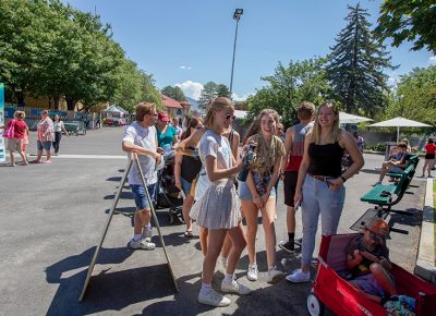 Attendees patiently wait in line to get their totem bags prints by Copper Palate Press.