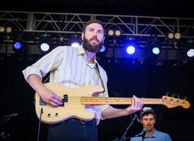 With instrument in hand, Foxwarren bassist Darryl Kissick looks out over the SLC crowd.