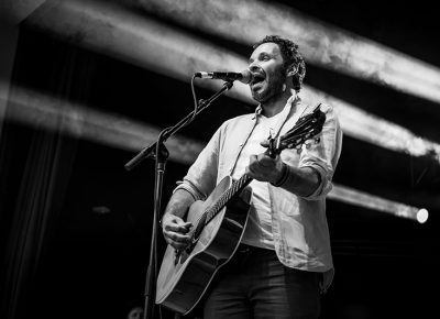 Blind Pilot frontman Israel Nebeker belts out a verse from the band’s new album, And Then Like Lions