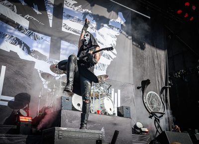 Pumped and primed to rock, Behemoth guitarist jumps on a cabinet at Thursday night’s Knotfest Roadshow.