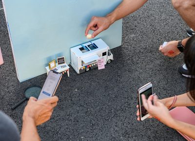 A mini macaron food truck by Tiny Art Show.