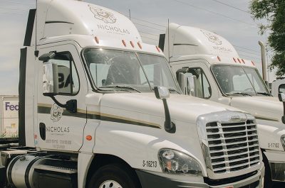 A team of Nicholas and Company trucks ready to hit the streets.