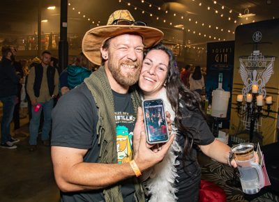 (L–R) John Hossley and Bec Strong after posing in Holystone Distilling’s photo lounge. Hossley is a fan of Holystone’s Navy Strength Gin.