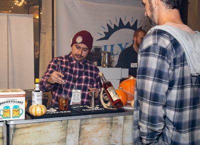 High West’s Julio Chavarria stirs up a Yipee Ki Yay old fashioned at Boo!stillery.