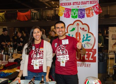 (L–R) Andrea and Javier Chávez Jr. promote Zólupez Cervesa at Boo!stillery.