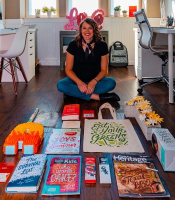 Becca Clason with a variety of her designs.