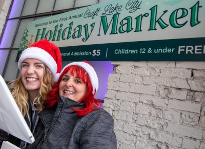 Two CLC teamsters show their excitement and holiday cheer.