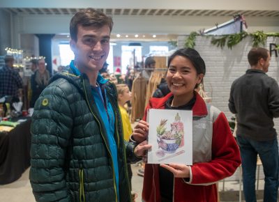 (L–R) Bren and Katherine picked up a print for Bren’s brother. It’s a silly cat print that will suit his brother’s sense of style and humor.