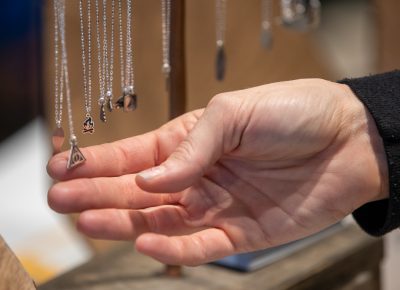 The Bearded Jeweler makes camping-themed charms on necklaces. The outdoor themes and reasonable prices hit the Holiday Market’s sweet spot.