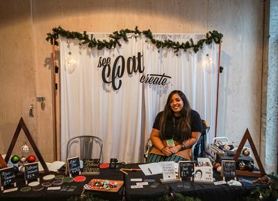 Catrina Cruz helping people get custom ornaments just in time for the holidays.