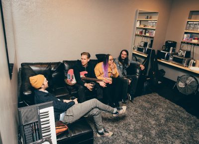 Some members of Beachmen hanging out in the green room before they perform.