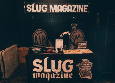 SLUG Magazine booth at the Localized event with all sorts of goodies.