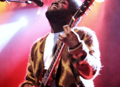 Michael Kiwanuka basking in the light of the stage and the adoration of the audience.