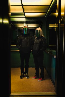 "The masked duo of Passive Refraction consists of two people, JXX and JXY—though, when performing together, the view themselves simply as one single J."