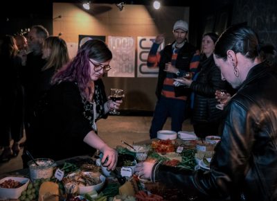 Lightscatter Press hosted a launch party on February 28, 2020, which included beer, wine and a table chock full o’ charcuterie.