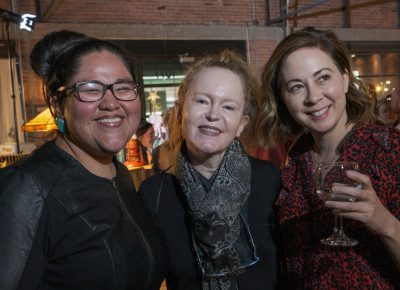 (L–R) Lightscatter board member Tacey Atsitty, Jennifer Tonge and Paisley Rekdal create sparks as they mingle at the Lightscatter Press launch party.