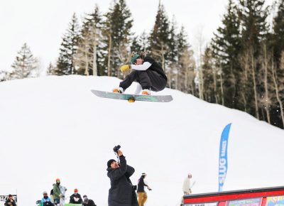 Boarder flies over photographer Jovvany Villalobos while doing a heel side grab over the jump at the SLUG 20th Anniversary Meltdown Games at Brighton Resort.