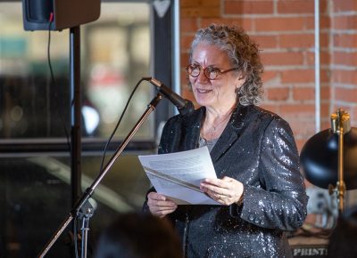 Lisa Bickmore introduces poet Jacquline Balderrama.