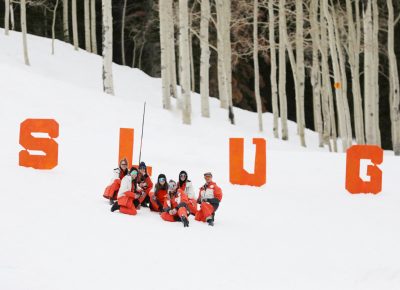 SLUG Team poses for a picture at the top of the hill with the S L U G Letters at the SLUG 20th Anniversary Meltdown Games at Brighton Resort.