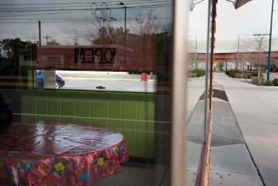 The famous original North Temple location of Red Iguana stands eerily empty. The dining room is usually swamped, and there's often a line of those waiting to be seated.