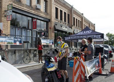 Davey Davis, 1st place finisher in the men's category, powers up with Oreos and a sip of water.