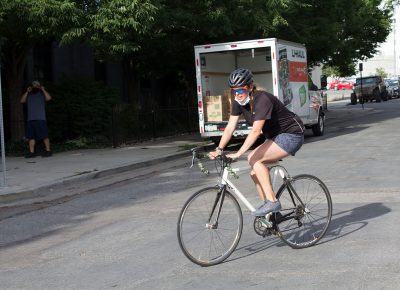 Britton Hatch, 2nd place finisher in the women's category, rides on with determination.