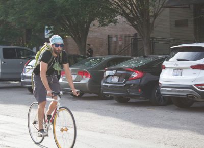 Joseph Williams, of Dead Fucking Last award-winning fame, peddles home after the 8th Annual SLUG Cat.