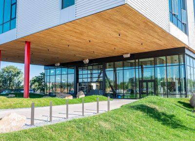 This striking overhang marks the new building's main entrance.