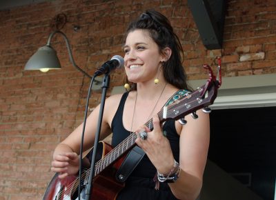 Rocky Lavoie smiles at the crowd and happy to be performing at the SLUG Picnic.