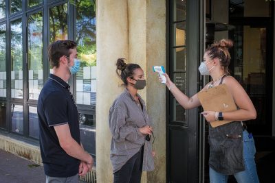 Patrons get a quick temperature check before entering the restaurant, ensuring that no one brings in a nasty fever.