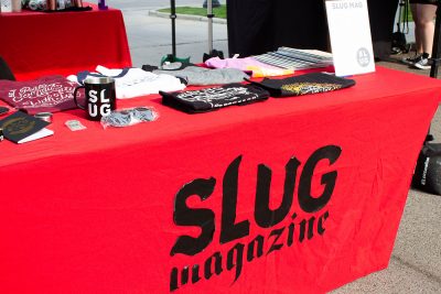 The SLUG booth offered merch and a raffle benefiting the Salt Lake COVID-19 Mutual Aid group.