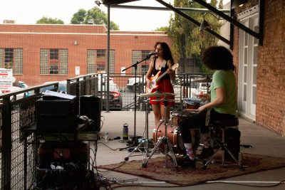 The musical symbiosis between Elowyn and Milo was infallible at the August SLUG Picnic. Photo: Morgan Keller