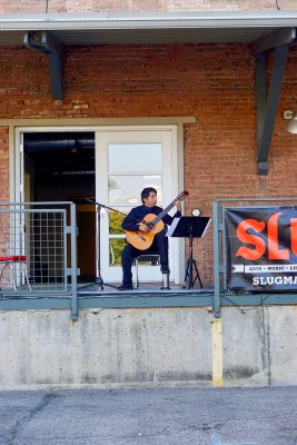 The September SLUG Picnic's first performer, Maestro Gabino Flores Classical Guitarist, brought his impressive technicality to the stage.