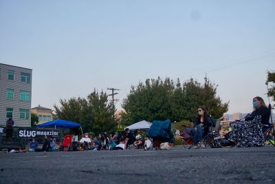 The September SLUG Picnic crowd awaits the performances with rapt attention.