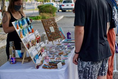 Among the art for sale at the September SLUG Picnic were Space Babes Art's colorful prints.