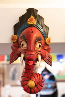 The wooden mahalaka masks available at Himalayan Arts speak to Owner Yeshi Shekhand's Tibetan heritage (1/3).