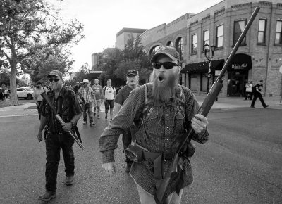 Counter protesters follow the Black Lives Matter protesters down Center Street, as they march to the City and County Building in Provo, Wednesday July 1, 2020.