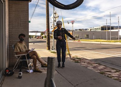 A racer attempts to gain bonus points with a successful tire toss at the Bicycle Collective.