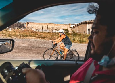 SLUG videographer Eudo Quiroz captures footage of a racer while en route to the next stop.