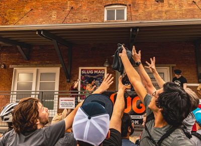 Chaos ensues as the merch flies at the 9th Annual SLUG Cat.