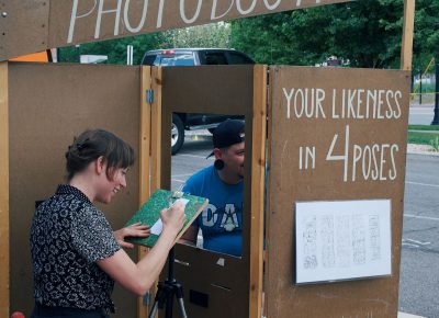 In between sets, the audience checks out the many local artisans such as the Hand Drawn Photo Booth.